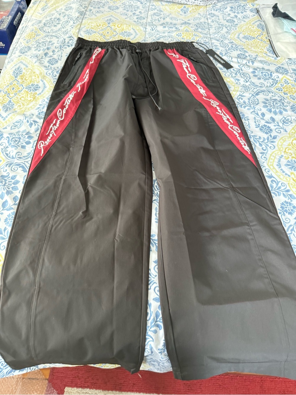 Civil Regime Black Wide-Leg Track Pants with Red Side Panels